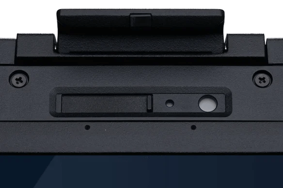 Close-up of the lower front mounting area of a black tactical keyboard or gaming accessory, showing screws, a recessed slot, and circular cutouts against a white background.